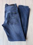 Nudie Jeans trasiga fickor Thin Finn, storlek W32 L32