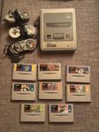 Super Nintendo + 8 spel + 3 kontroller (original)