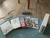 Wii-konsol och fem spel