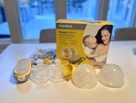 Medela Freestyle - bärbar elektrisk dubbelbröstpump