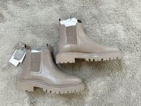 Beiga Chelsea boots i läder