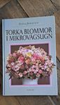 Bok; tirka blommor i mikrovågsugn 