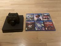 PS4 Slim 500 GB med två kontroller, laddare och sex spel