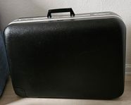 Mellanstor hård rullbar resväska luggage suitcase. 2 hjul.