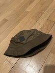 Acne Studios kopparfärgad bucket hat 