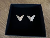 ”Miss butterfly ear” i silver, av Efva Attling - NYA