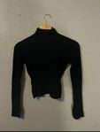 svart turtleneck