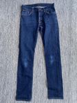 Mörkblåa jeans W30/L34 från Nudie Jeans modell Grim Trim