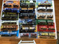 18 st Lastbilar med släpvagn. skala 1:87