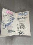 Signerad Harry Potter bok av många från filmerna, äkta