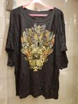 Bli ensam om en unik italiensk svart designertop stl L/XL