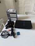 PLAYSTATION 2 med tillbehör och 16 spel 