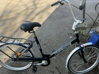 flickan cyklar 24 tum kan pojken cykla 