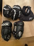 Hockey handskar barn och ett halsskydd till barn