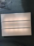 lightbox med massvis av bokstäver och tecken 
