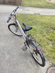 Grå herrcykel 