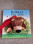 konrad vill leka, bok med handdocka