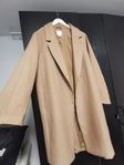 Beige kappa over size 