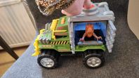 Dinosaurie Transportbil Leksak låter och har en dinosaurie 