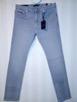 Tommy Hilfiger gråa herr jeansbyxor, storlek L