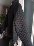 Svart märkesjacka Aimn