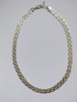 Flätat halsband i silver