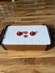 Air hockey spel