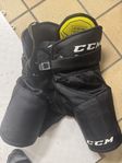 hockey byxor CCM junior svart