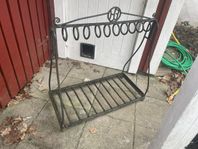 Antikt cykelställ i gjutjärn med monogram 