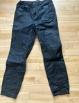 Jeans i skinn imitation 