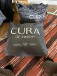Cura täcken