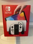 Nintendo Switch med vita Joy-Con-kontroller