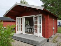 Välinredd stuga för avhämtning