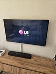 LG tv med väldigt bra bild och Denon soundbar.