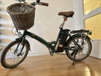 Elcykel ihopfällbar Kringla + laddare, korg, lås