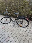 Veterancykel med trähandtag