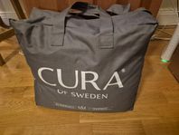 Cura täcke