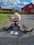 Stokke Trailz Barnvagn med liggdel, sittdel och ståbräda.