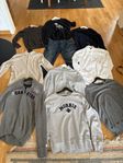 Herrklädpaket med märkeskläder, skjortor och jeans. 