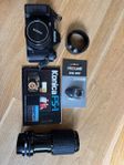 Konica FS-1 med utrustning. Vintage -kamera