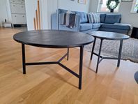 Soffbord av sten med metallben
