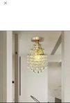 Elegant kristalltaklampa – en touch av lyx i ditt hem