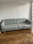 Ljusgrön soffa