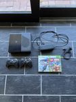Xbox 360 E / ELITE Konsol + 2 handkontroller, spel, laddare
