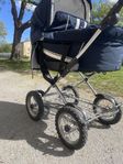 Barnvagn från Emmaljunga med ligg, sittdel och ståbräda