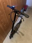 El scooter med laddare 