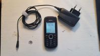 Nokia 1661 Mobiltelefon med Laddare