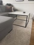 Soffbord vit marmor med svart underrede