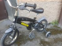 Stoy barncykel med stödhjul. 