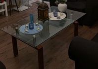 Stilrent soffbord i glas med träben – modernt och stabilt